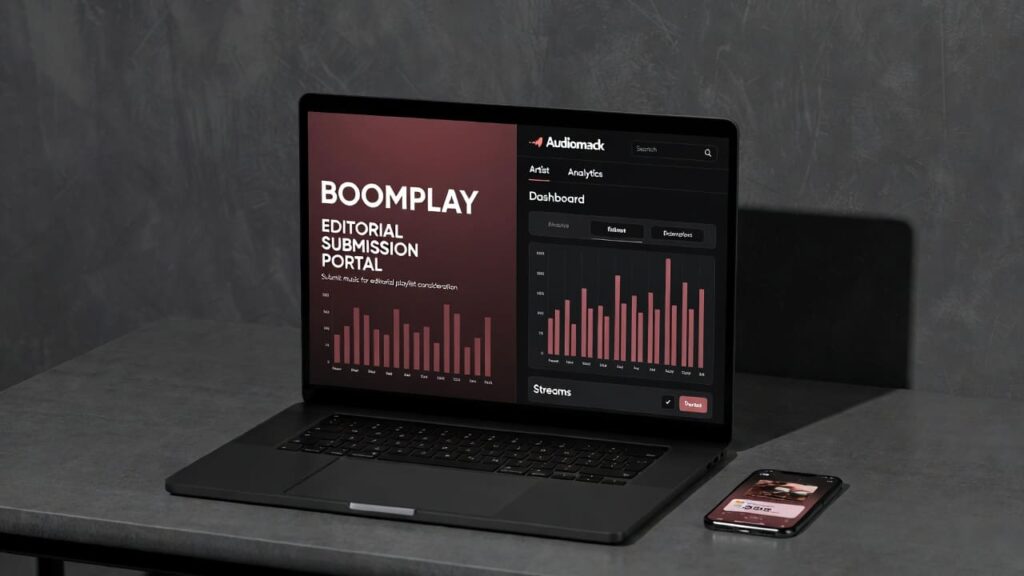 Laptop showing Boomplay and Audiomack playlist submission dashboards for a Nigerian artist