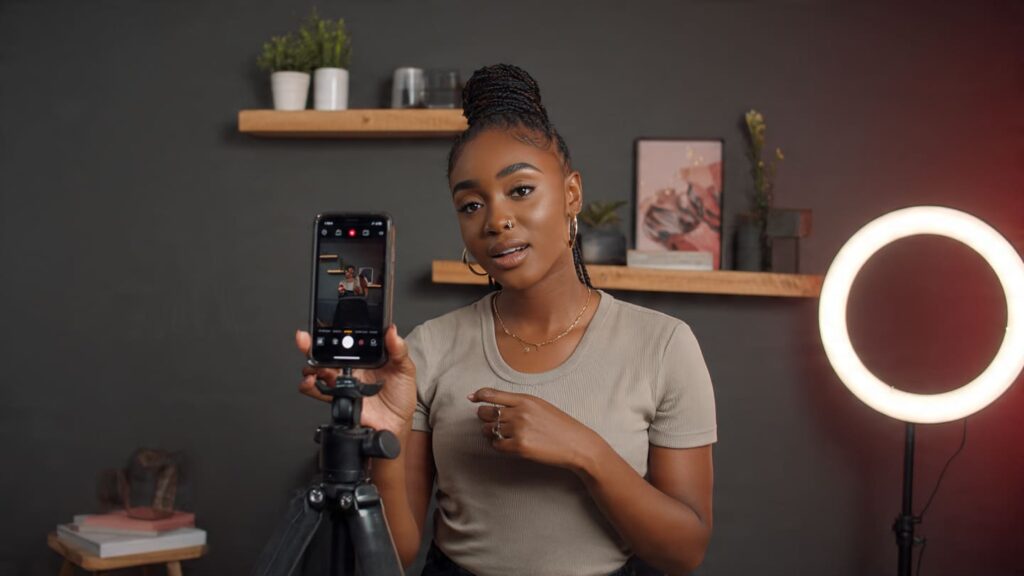 Nigerian lifestyle influencer recording a natural product endorsement video for Instagram Reels social proof